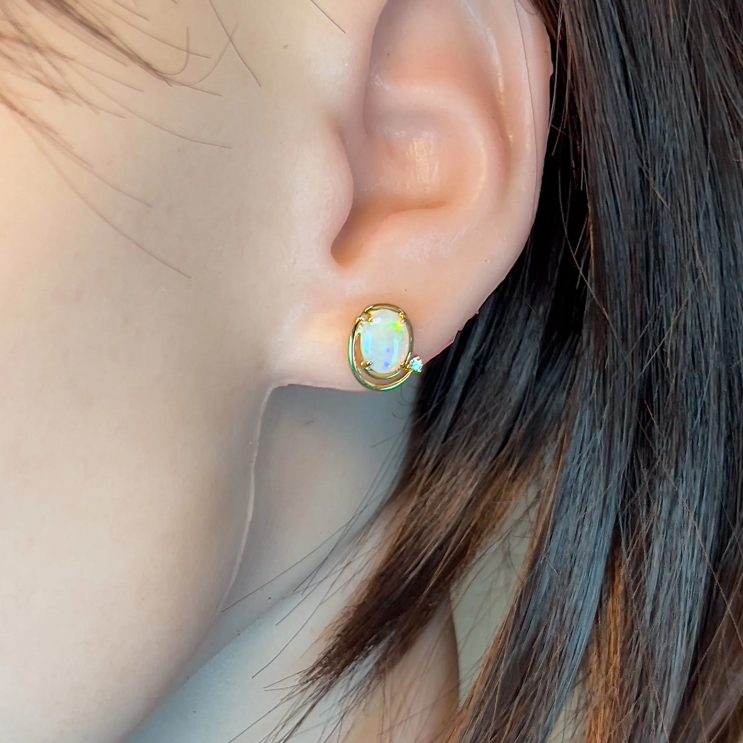 14kt Yellow Gold Oval Crystal Opal 1.48ct studs with diamonds