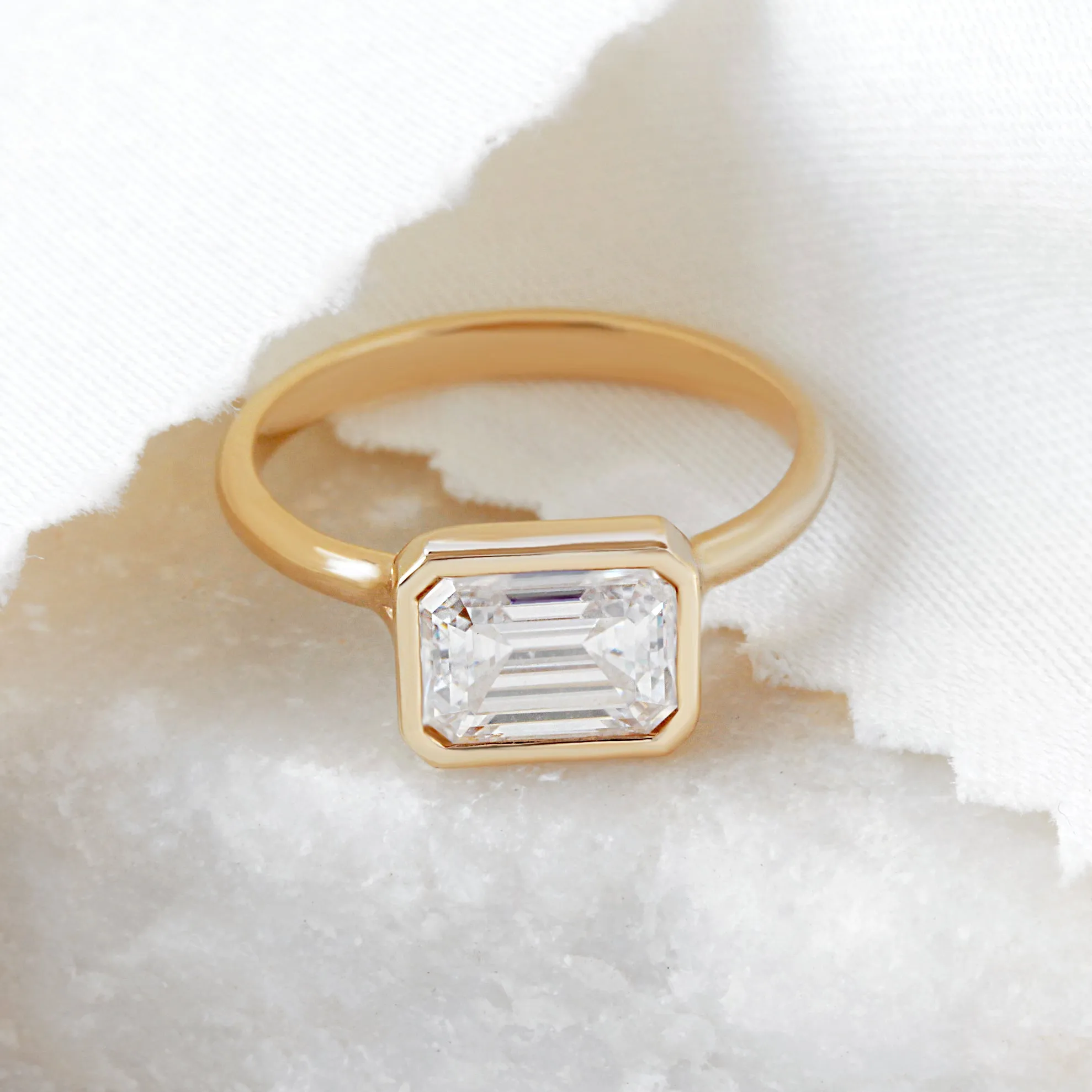 East West Emerald Cut Solitaire Bezel Set Diamond Engagement Ring - Jade
