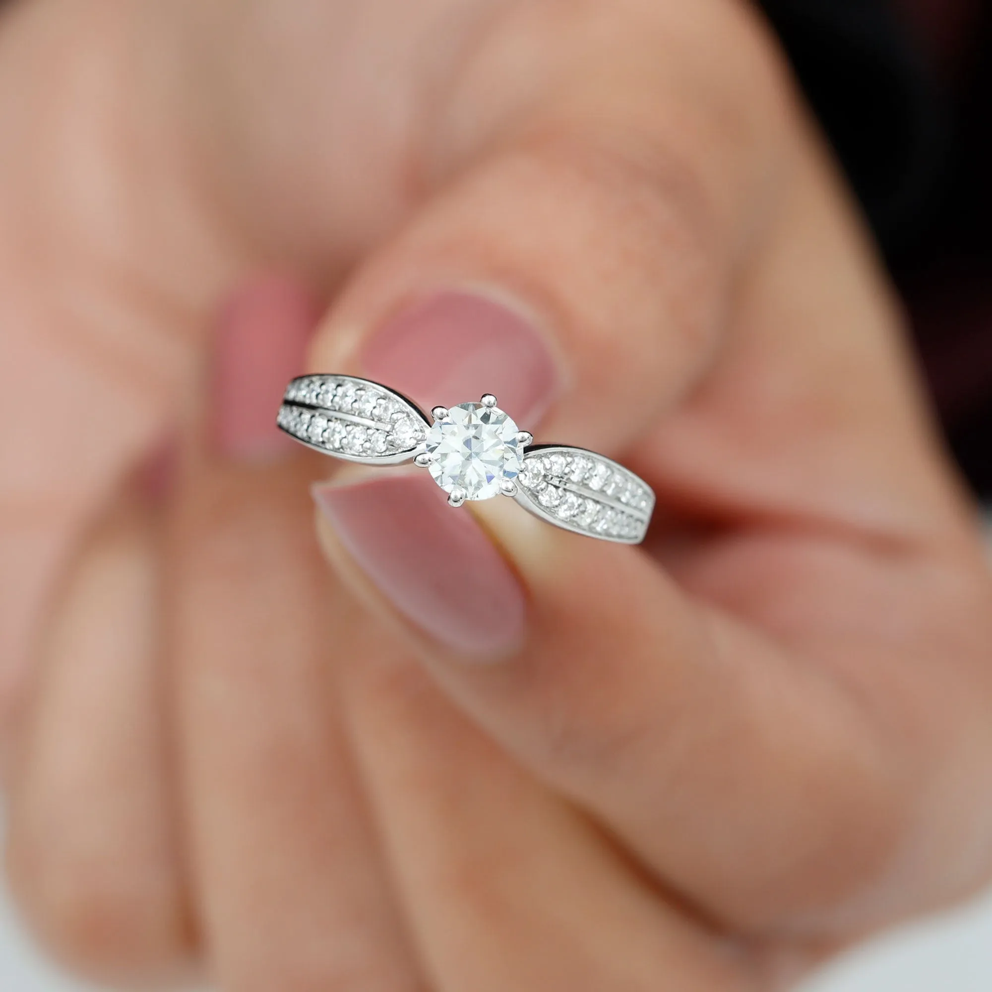 Elegant Round Moissanite Engagement Ring with Side Stones