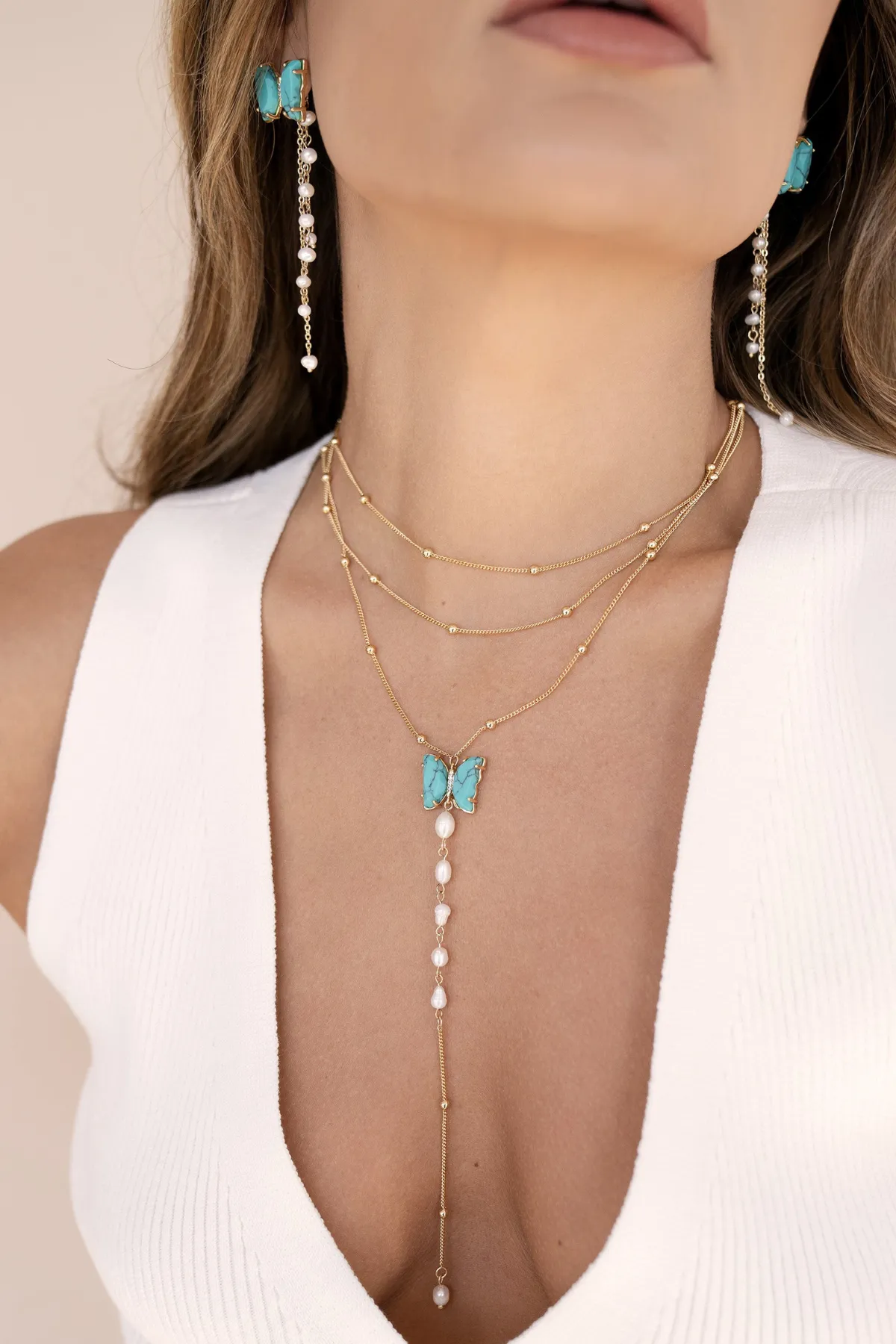 Ettika: Turquoise Butterfly Pearl Chain Lariat Necklace