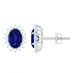Oval Cut Created Blue Sapphire Stud Earrings with Moissanite Halo