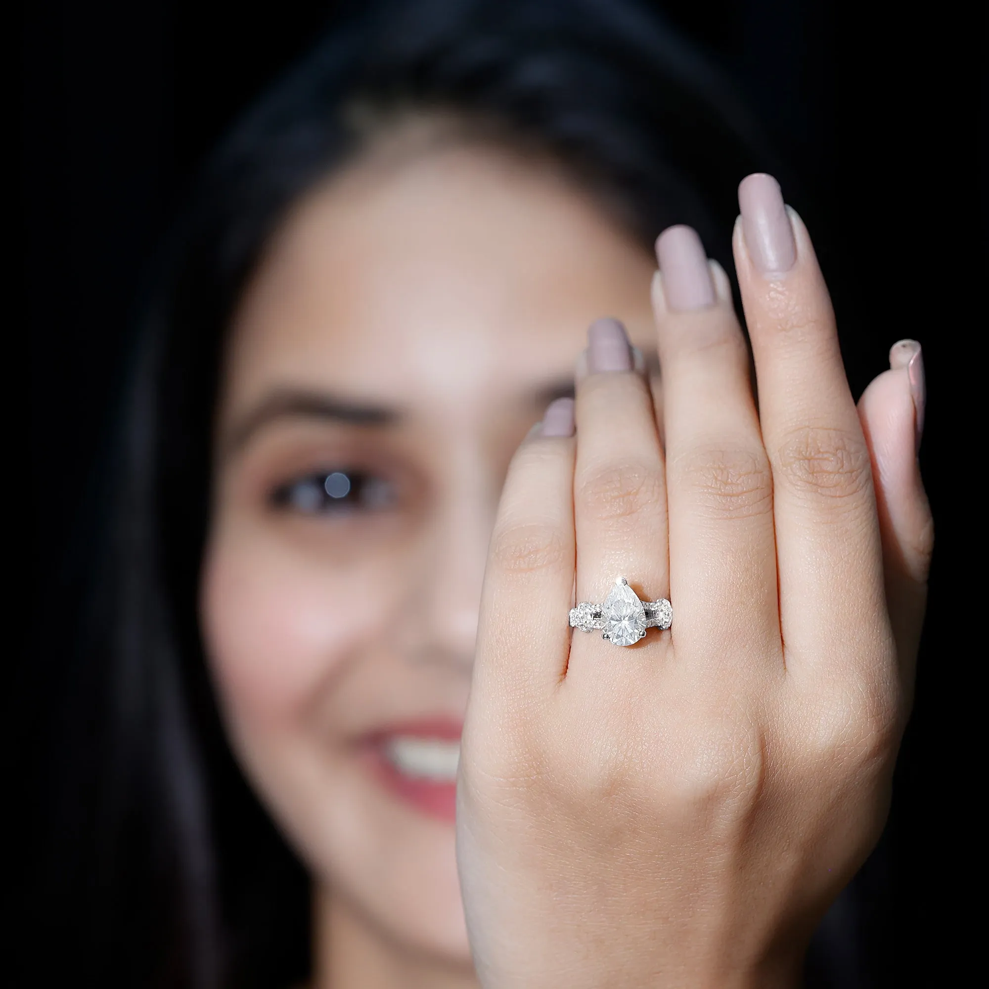 Pear Shaped Moissanite Solitaire Engagement Ring in Split Shank