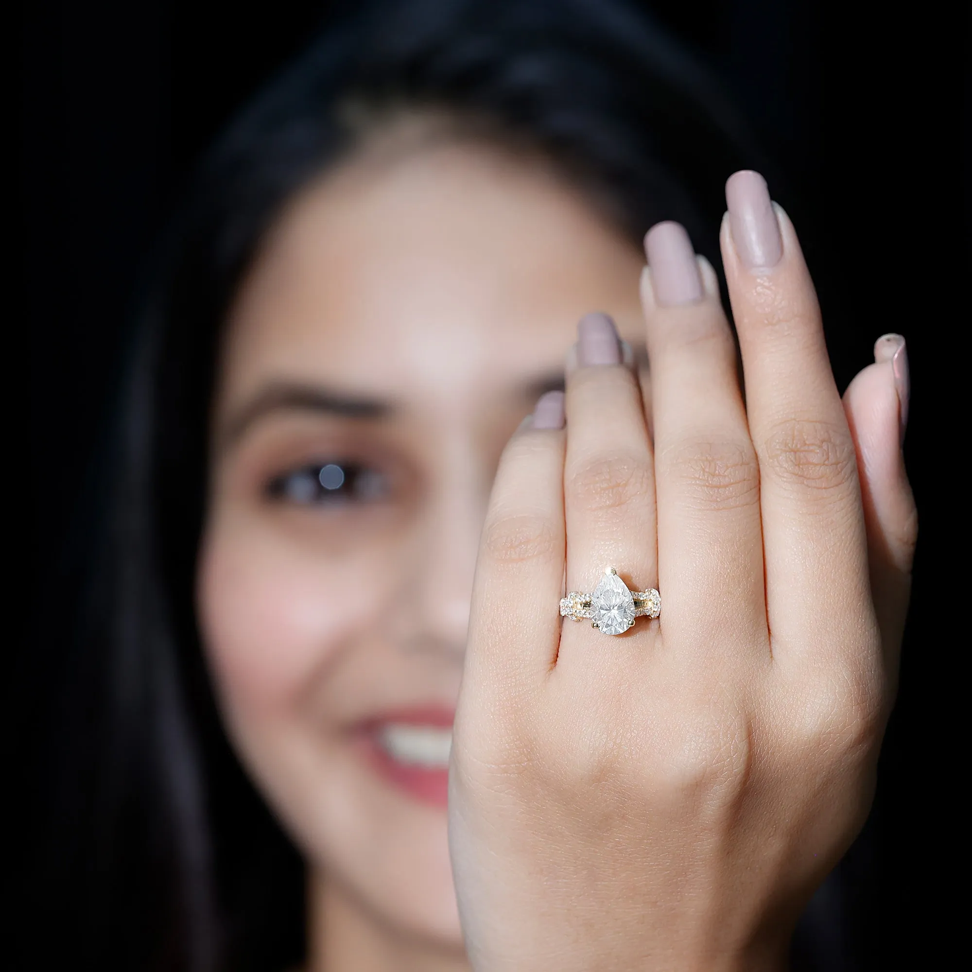 Pear Shaped Moissanite Solitaire Engagement Ring in Split Shank