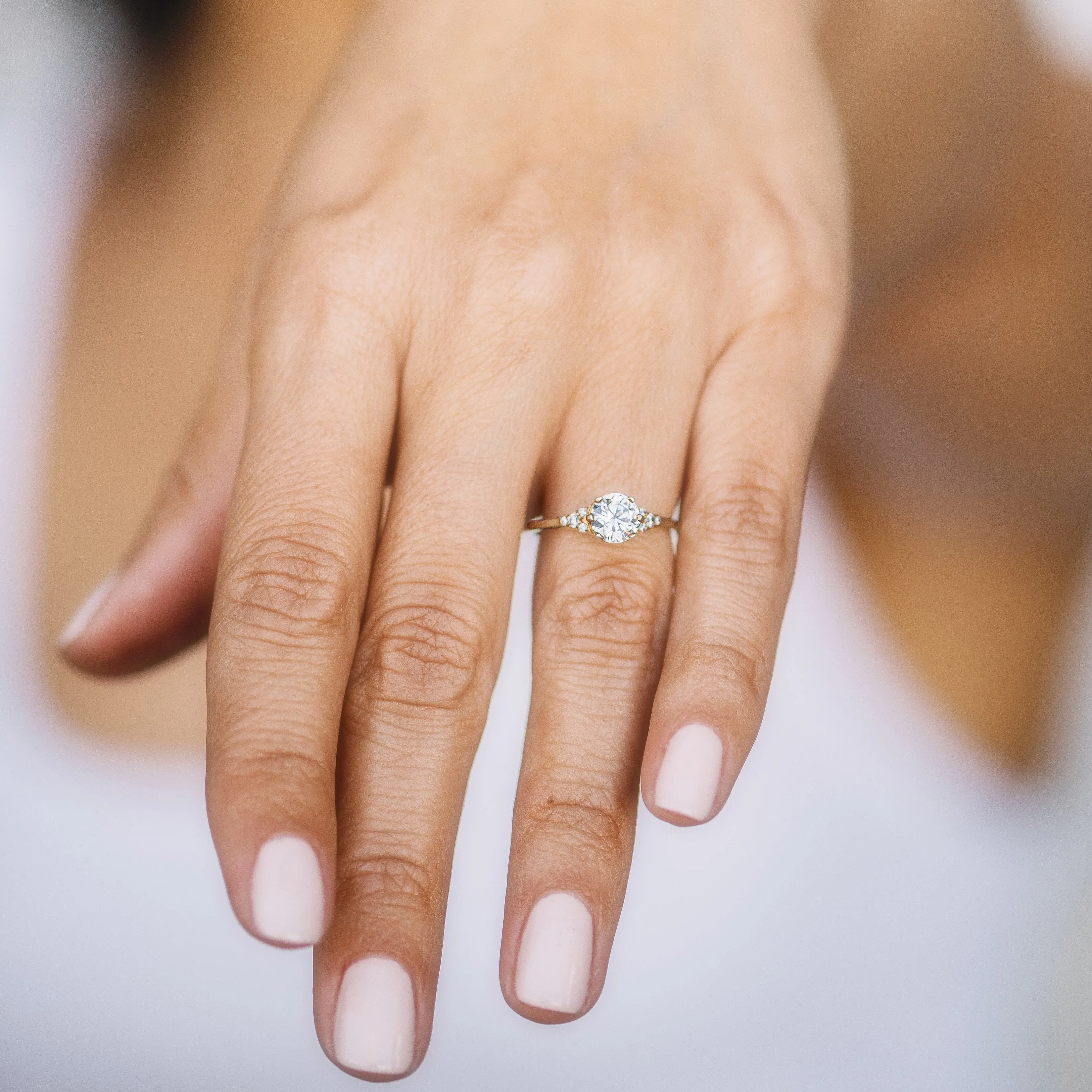 Round Diamond and Tiny Pavé Side Stones Engagement Ring