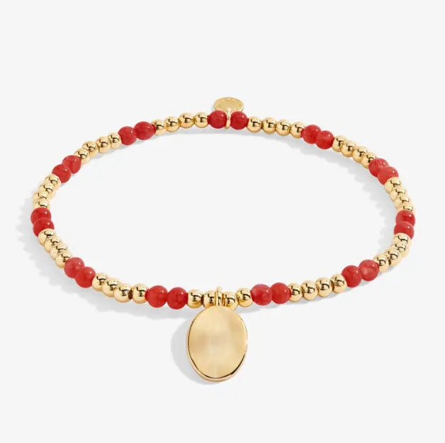 The January Birthstone Stretch Bracelet in Garnet