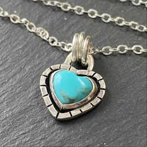 Turquoise heart necklace hand crafted from sterling silver and genuine heart shaped turquoise